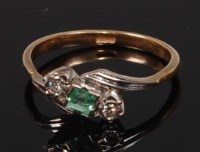 Lot 2299 - A 9ct gold, emerald and diamond dress ring,...