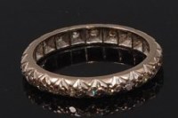 Lot 2307 - An 18ct white gold diamond eternity ring,...