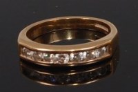 Lot 2314 - An 18ct gold diamond set half hoop ring,...
