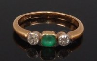 Lot 2317 - An 18ct gold, emerald and diamond ring, the...
