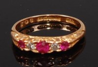 Lot 2322 - An 18ct gold, ruby and diamond dress ring, as...