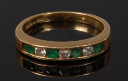 Lot 2086 - An 18ct gold, emerald and diamond set ring,...