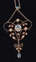 Lot 2337 - An Edwardian 9ct gold, aquamarine and seed...