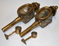 Lot 70 - A pair of reproduction brass coaching lamps in...