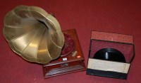 Lot 82 - A reproduction HMV table top wind-up...