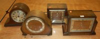 Lot 112 - An Art Deco oak cased mantel clock, having a...