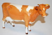 Lot 190 - A Beswick figure of a Guernsey cow, model...