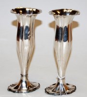 Lot 201 - A pair of George V silver spill vases of...