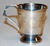 Lot 207 - A George V silver christening mug of plain...