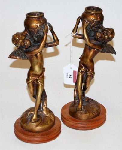 Lot 34 - A pair of reproduction bronzed figural...