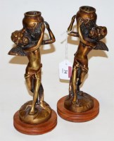 Lot 34 - A pair of reproduction bronzed figural...