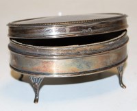 Lot 253 - A George V silver trinket box of plain oval...