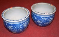 Lot 105 - A pair of Chinese blue and white stoneware...