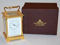 Lot 248 - A modern lacquered brass cased carriage clock...