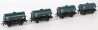 Lot 242 - Four Dublo D1 tank wagons total painted in...