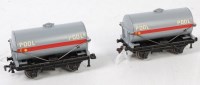 Lot 243 - Two Dublo D1 tank wagons total repaints as...
