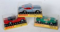 Lot 720 - Three various plastic cased Dinky Toys...