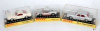 Lot 721 - Three various plastic cased Dinky Toy diecasts,...