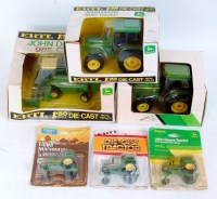 Lot 1210 - Six various boxed and carded ERTL mixed scale...