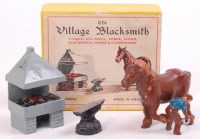 Lot 1266 - FG Taylor and Sons, The Village Blacksmith,...