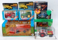 Lot 1326 - Seven various boxed or plastic cased tractor...