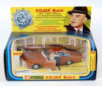 Lot 1669 - Corgi Toys, 290 Kojaks Buick, bronze body with...