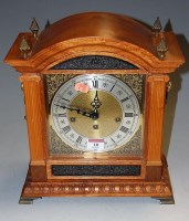 Lot 10 - A walnut and gilt metal mounted mantel clock...
