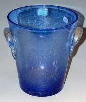 Lot 11 - A Farinelli blue tinted glass twin handled...