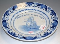 Lot 29 - A 19th century Delft blue and white charger,...