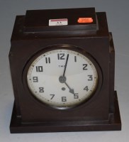 Lot 33 - A 1930s bakelite mantel clock of stepped form
