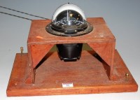 Lot 51 - A Sestrel ships table-top compass, mounted on...