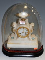 Lot 130 - A 19th century alabaster mantel clock having...