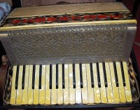 Lot 155 - A mid 20th century Vibratone piano accordion...