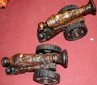 Lot 169 - A pair of stained wood models of cannons