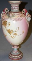 Lot 176 - A Royal Worcester glazed porcelain twin...