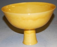 Lot 186 - A Chinese porcelain stem bowl, the yellow...