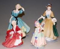 Lot 200 - A collection of four Royal Doulton figurines...