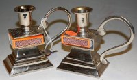 Lot 203 - A pair of silver plated single handled...