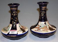 Lot 207 - A pair of Japanese Taisho period glazed...