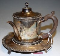 Lot 239 - A late George III silver cafe au lait pot on...