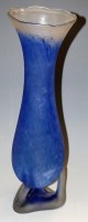 Lot 110 - A large art glass vase having blue cased and...