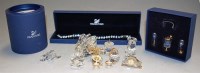 Lot 211 - A small collection of Swarovski cut crystal...