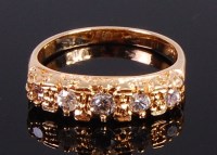 Lot 2352 - An 18ct gold and diamond set five stone ring,...