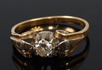 Lot 2005 - A yellow metal diamond solitaire ring, the...