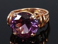 Lot 2235 - A 9ct gold and amethyst dress ring, the large...