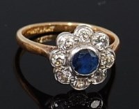 Lot 2239 - An 18ct gold and platinum, sapphire and...