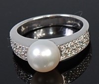 Lot 2245 - An 18ct white gold, cultured pearl and diamond...