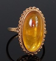 Lot 2249 - A modern 9ct gold and cabochon clear orange...