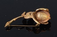 Lot 2261 - A 9ct gold pin brooch modelled as a flower bud,...