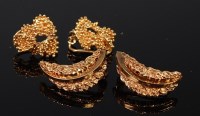 Lot 2277 - A pair of modern 9ct gold ear clips, each of...